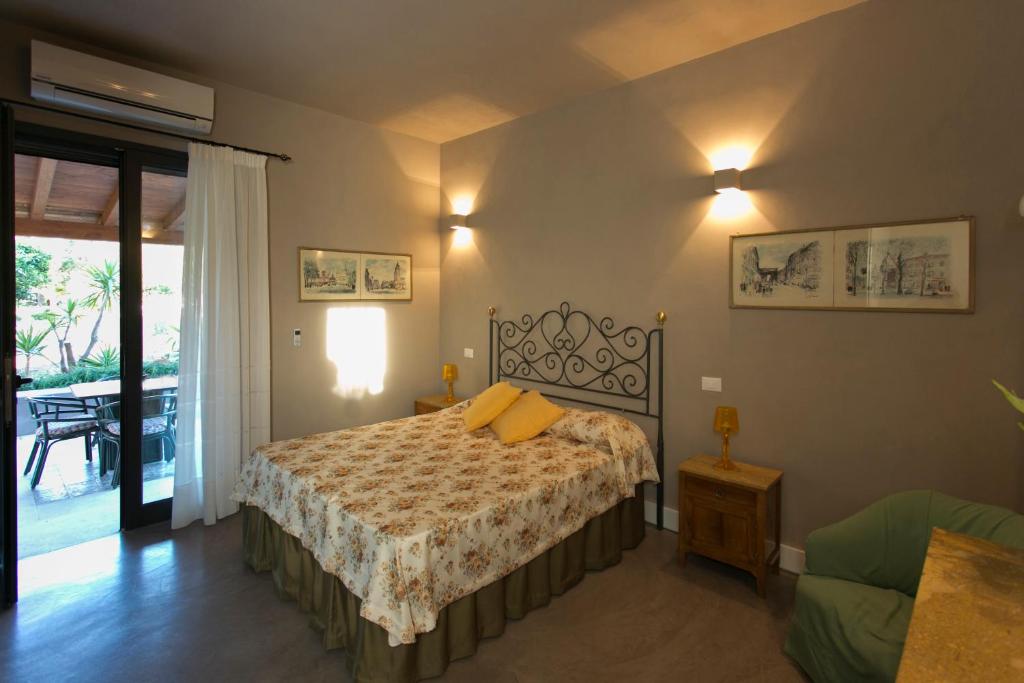 Postel nebo postele na pokoji v ubytování Baglio Sant'Andrea
