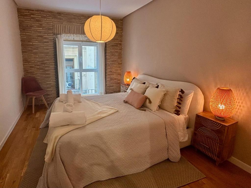 Ένα ή περισσότερα κρεβάτια σε δωμάτιο στο Impresionante Tríplex en Canaleja, Sol