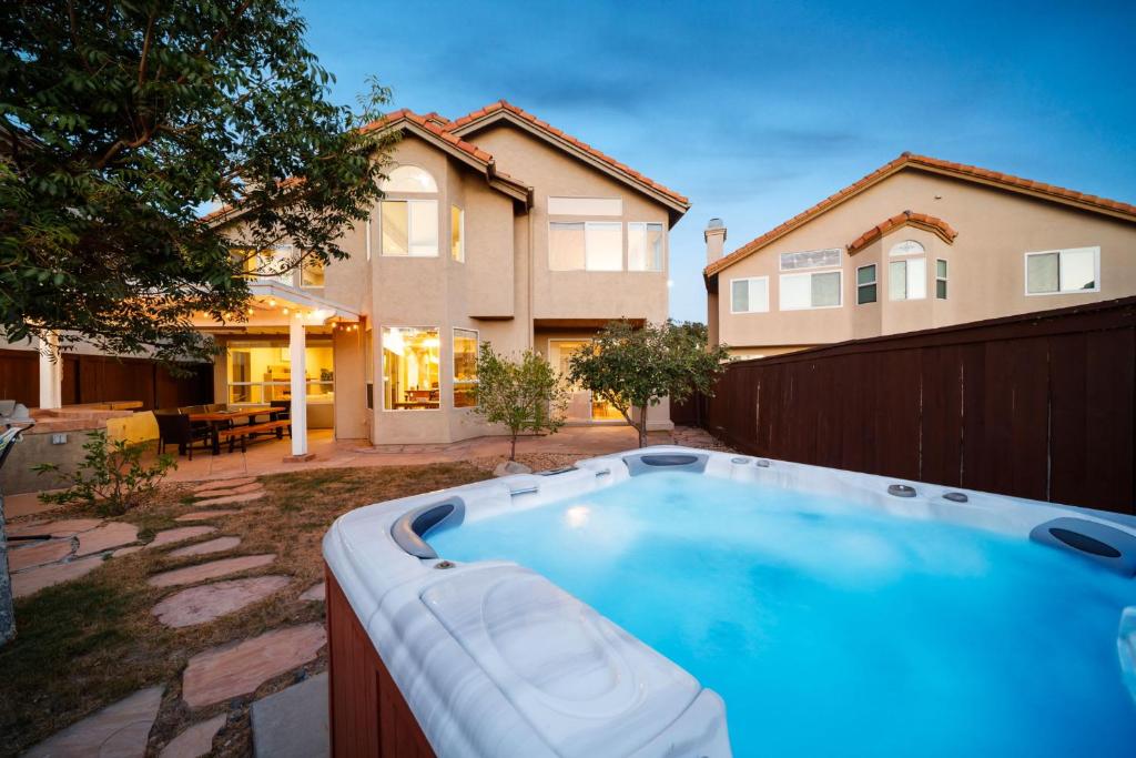 a hot tub in the backyard of a house at Rancho Bernardo Home - Game Room Outdoor Living in Rancho Bernardo