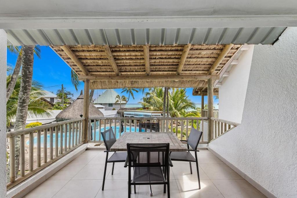 Visual Reference: Grand Sahāna 9 2Br Beachfront Apartment With Balcony Terrace