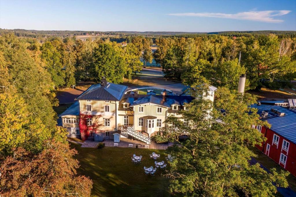 an aerial view of a large house in the woods at KAL791-Vimmerby-Fredensborg-120 in Storebro