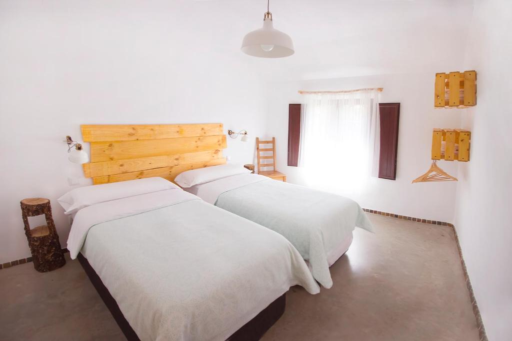 Postel nebo postele na pokoji v ubytování El Pajar Negro