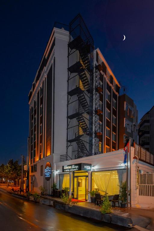 a building with a tent in front of it at night at DIAMOND Luxury Hotel in Antalya