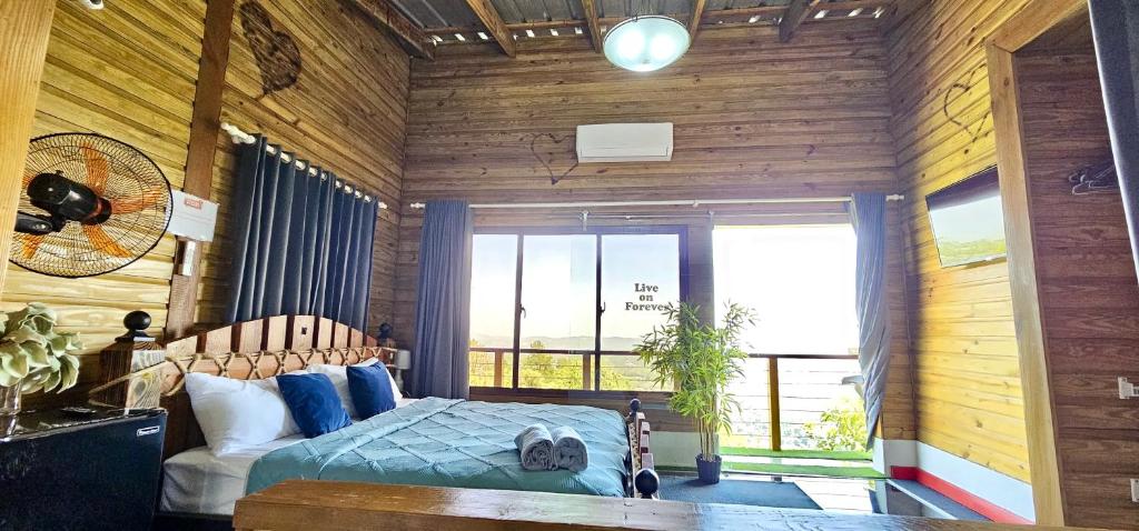 Una cama o camas en una habitación de Villa Leon