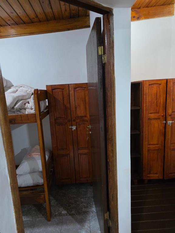 Ένα ή περισσότερα κρεβάτια σε δωμάτιο στο Alojamiento temporario en el centro de Posadas, Misiones para 6 personas