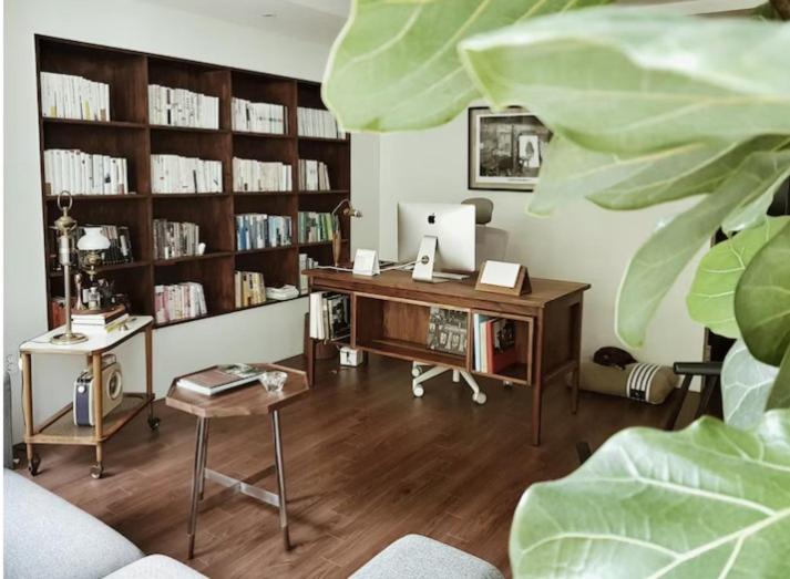 a room with a desk with a computer in it at Bora's cozy house in Samgong