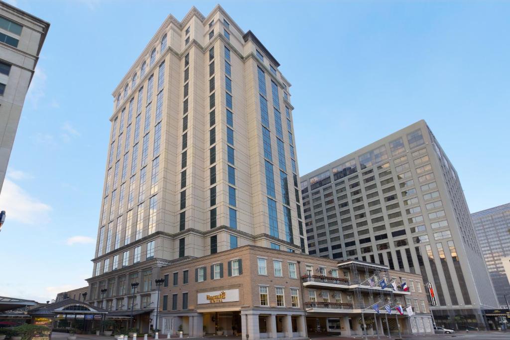 a tall building in the middle of a city at Harrah's New Orleans Hotel & Casino - A Caesars Rewards Destination in New Orleans