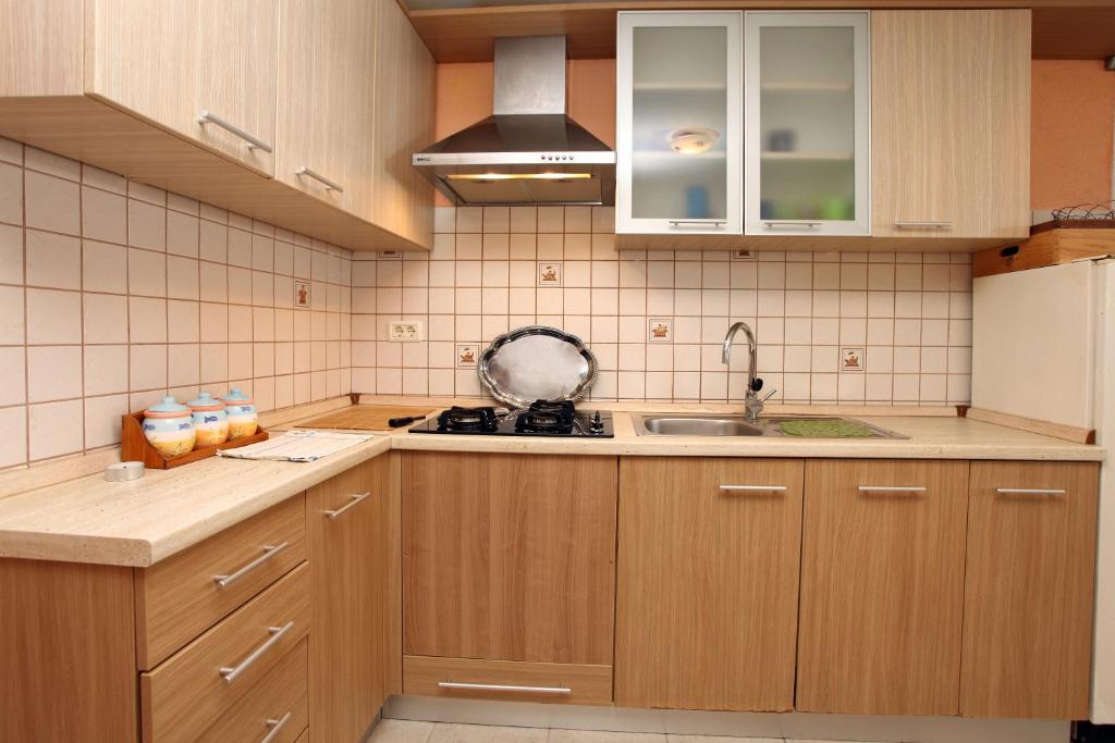 Kuchnia lub aneks kuchenny w obiekcie Lovely Apartment ES