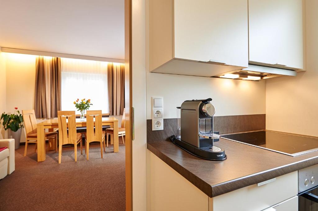 Kuchyň nebo kuchyňský kout v ubytování Apartment Panorama