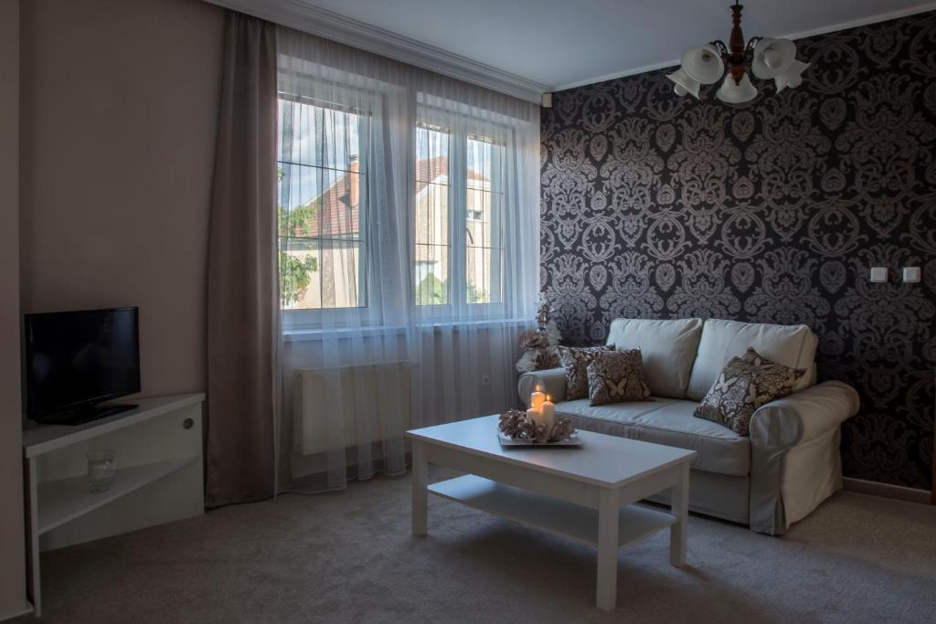 TV a/nebo společenská místnost v ubytování Villa Grande - Apartmány