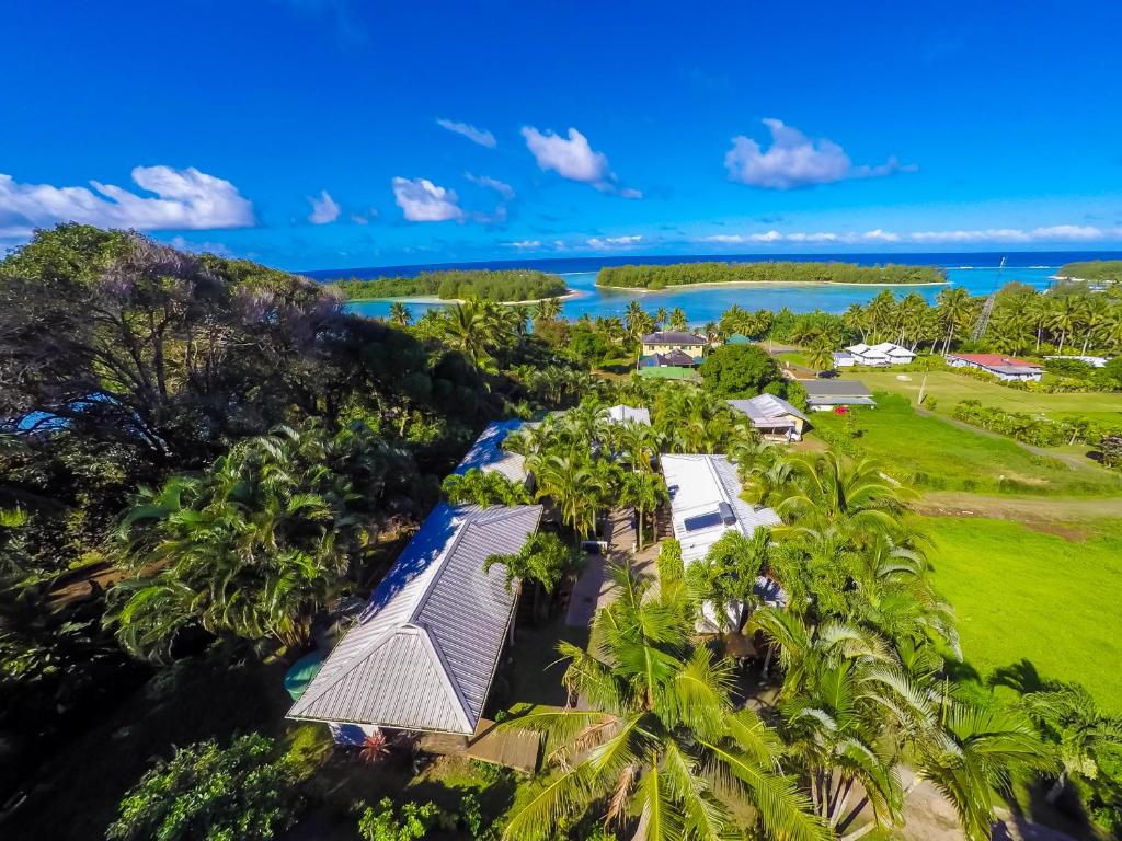 an aerial view of a resort with palm trees at Muri Lagoon View Bungalows - Hillside Bungalow in Rarotonga