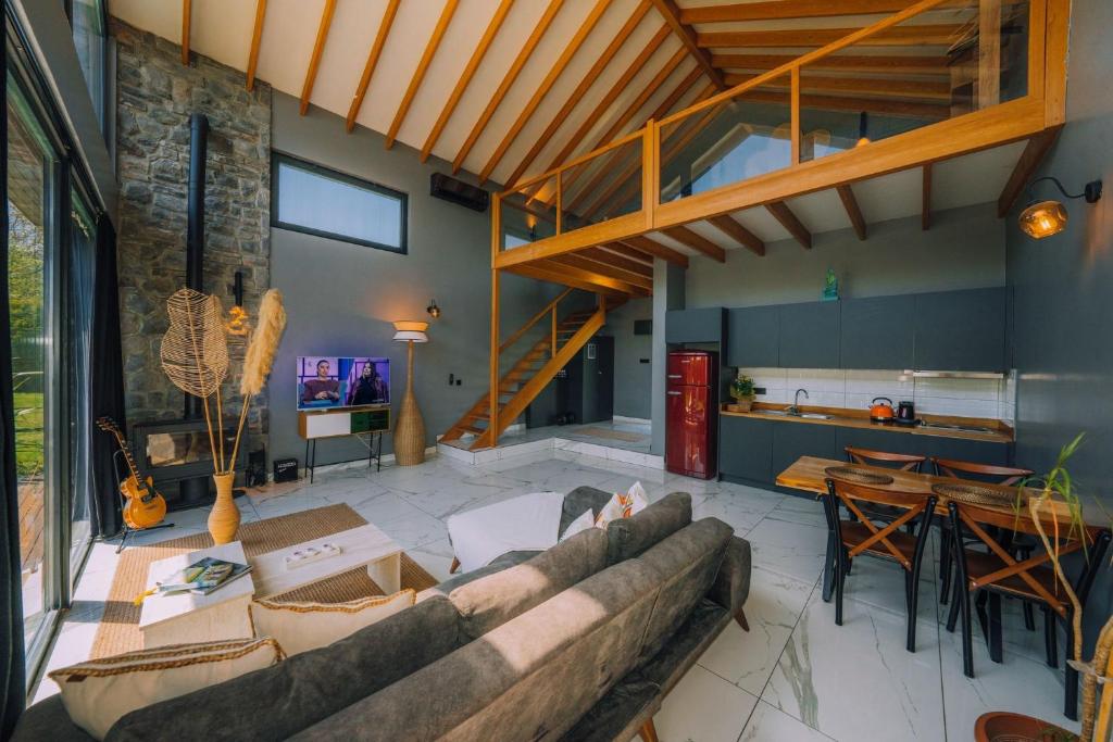 a living room with a couch and a table at Monk Living Space in Kocaeli