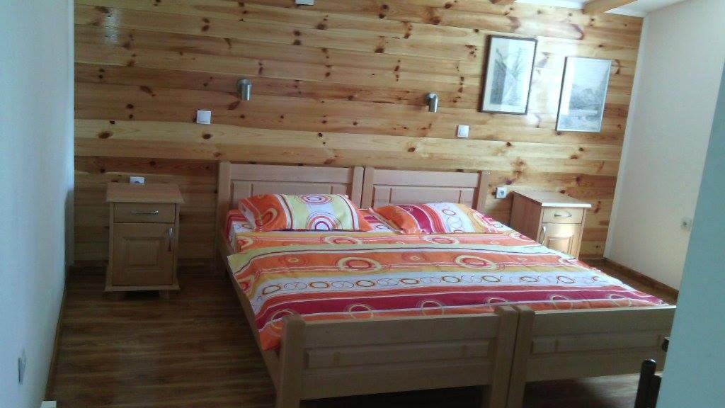 Postel nebo postele na pokoji v ubytování Apartments Grbović