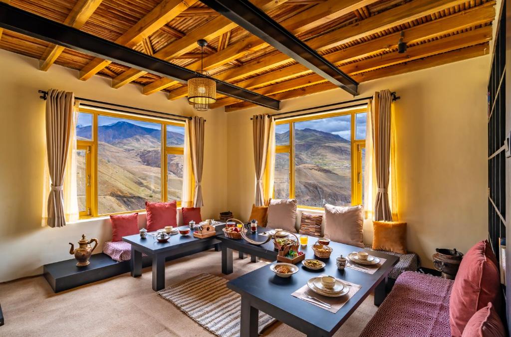Basic guesthouse room in Kaza with mountain view — Spiti Valley accommodation on Himachal adventure trip