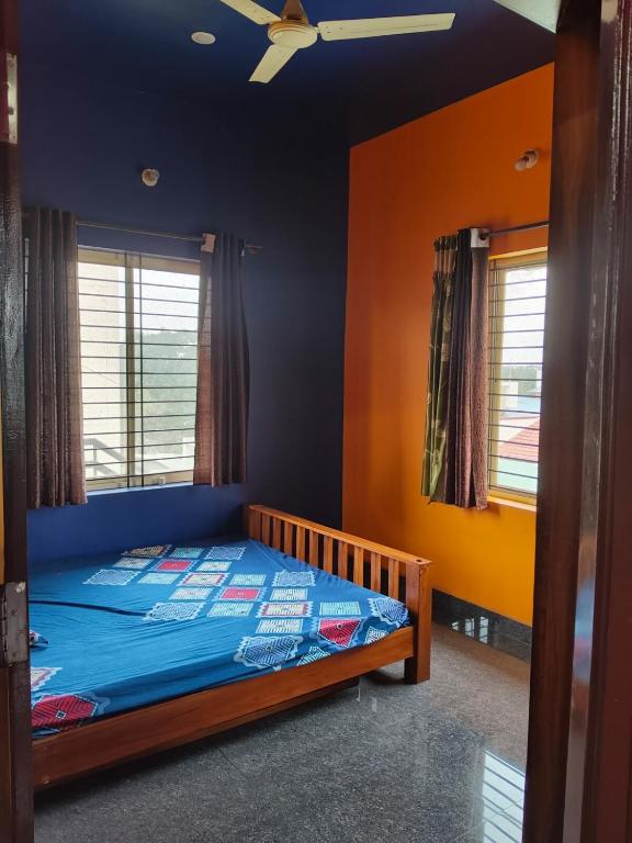 Ένα ή περισσότερα κρεβάτια σε δωμάτιο στο love moon home stay