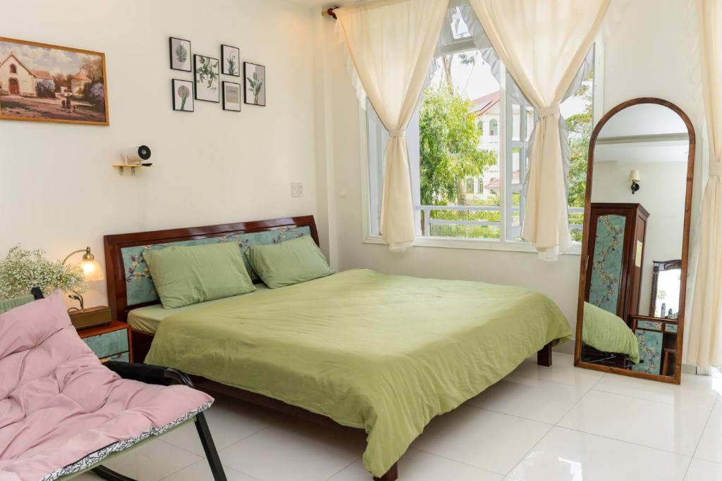 Кровать или кровати в номере Ichigo Home Đà Lạt