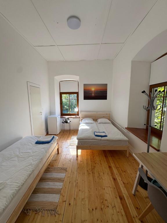 Ένα ή περισσότερα κρεβάτια σε δωμάτιο στο Ravelin