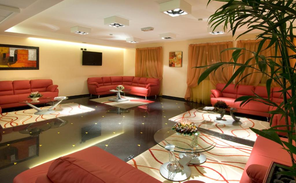 A seating area at As Hotel Cambiago