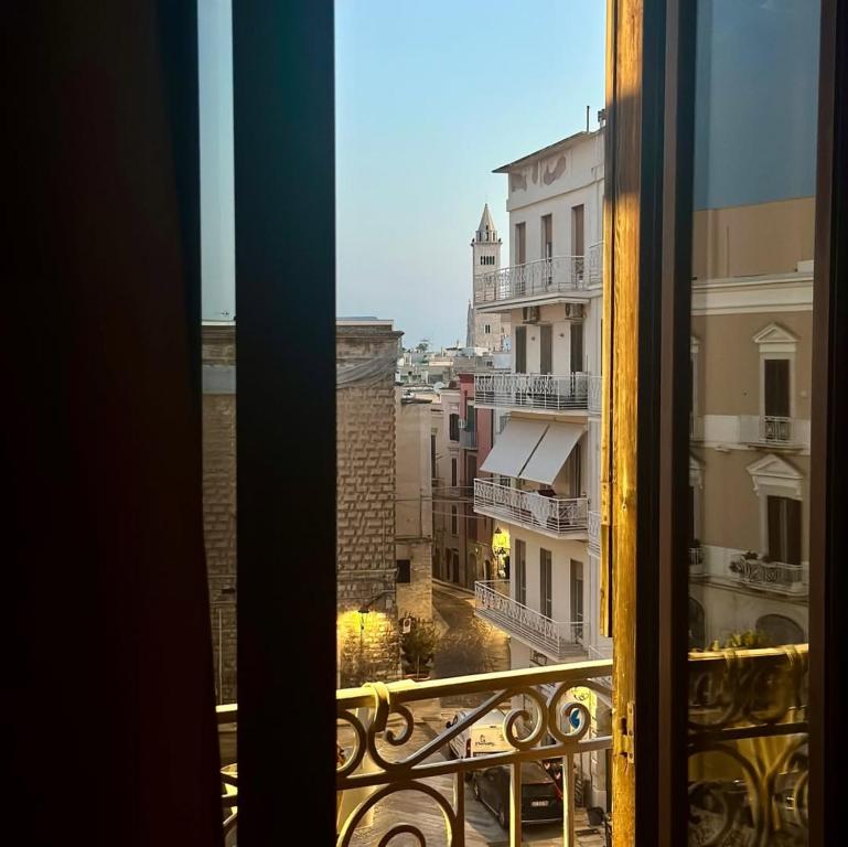 a view of a city from a window at Ognissanti80 in Trani