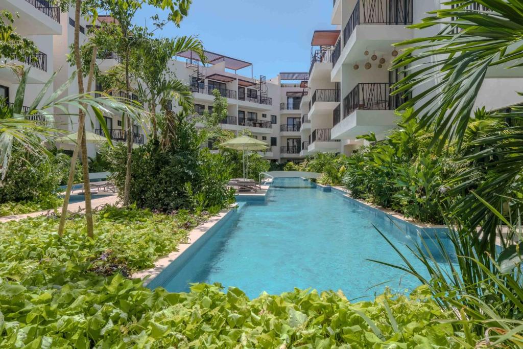 Πισίνα στο ή κοντά στο Boho Breeze at Costa Caribe