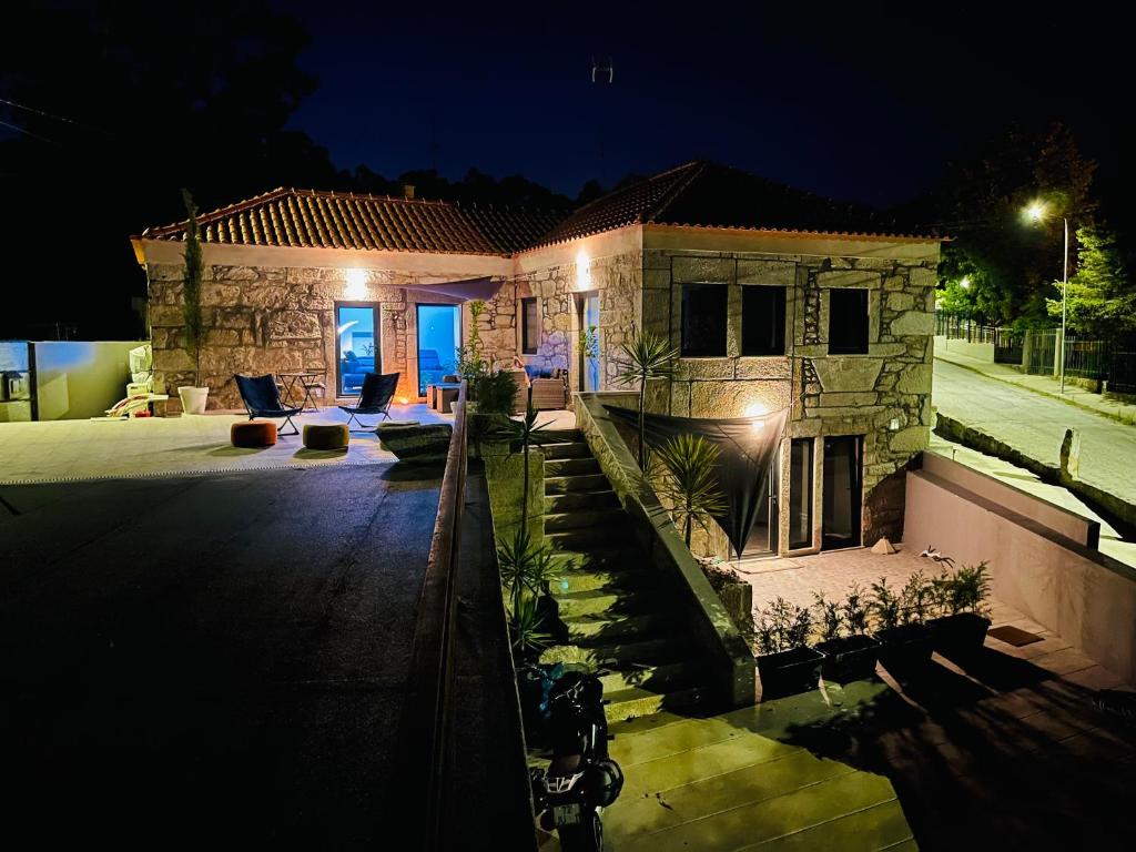 a house at night with the lights on at Living Viana do Castelo in Viana do Castelo