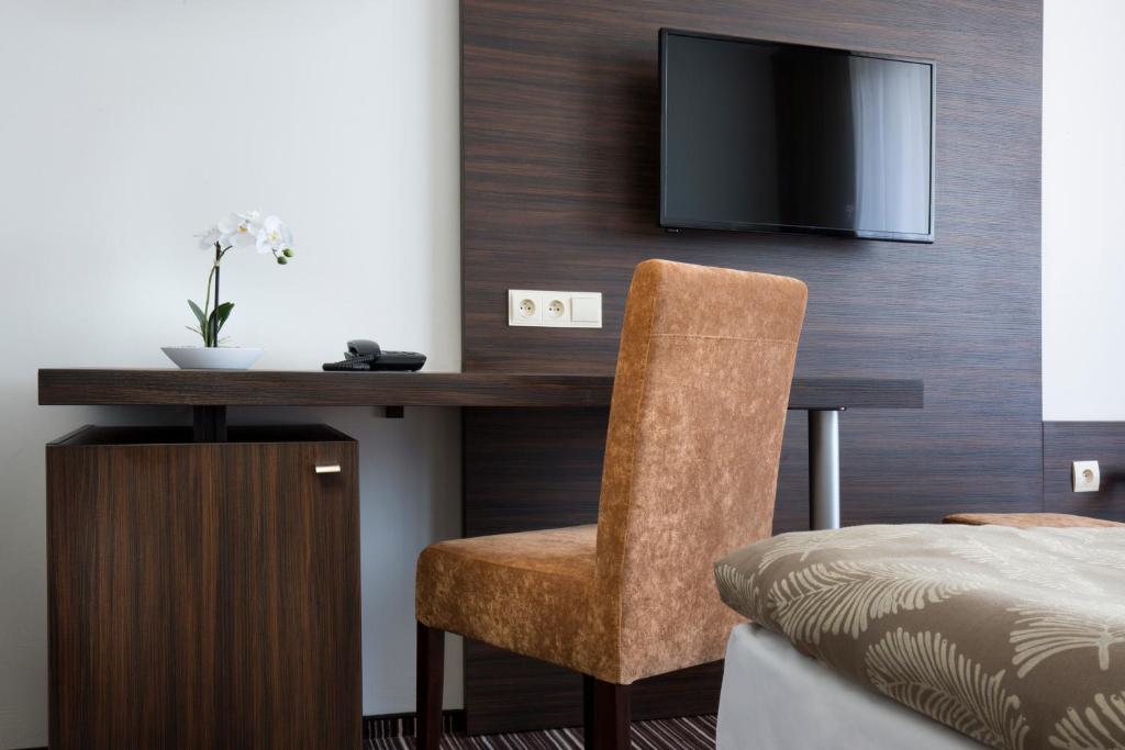 Sjónvarps- og/eða afþreyingartæki á Hotel SATEL