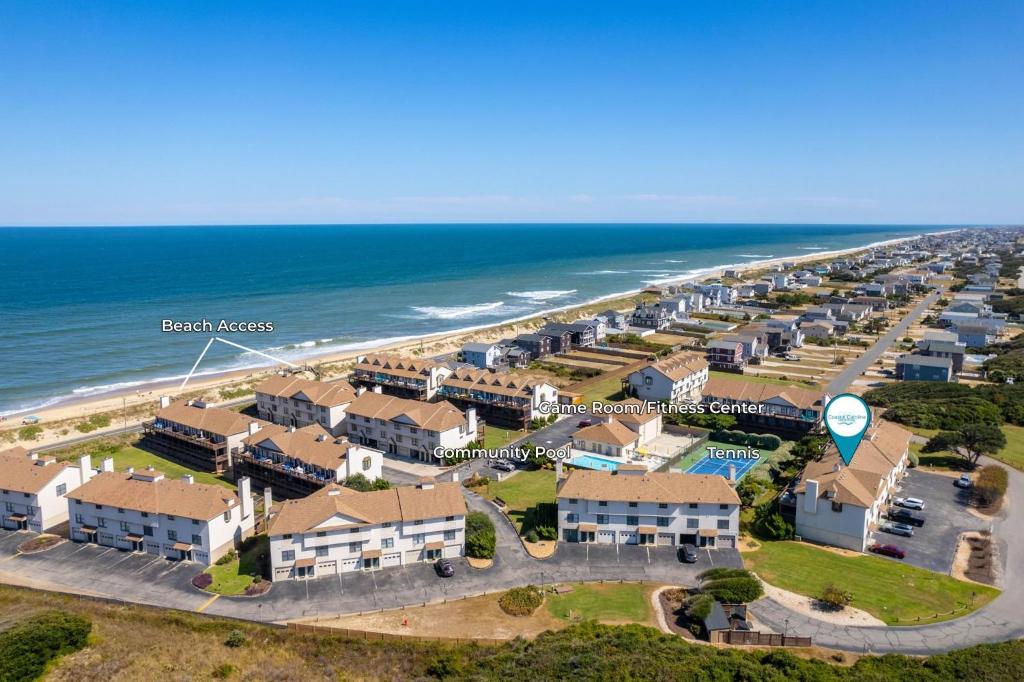 an aerial view of the beach houses on the beach at SDG2 Sea Glass Shack in Kitty Hawk