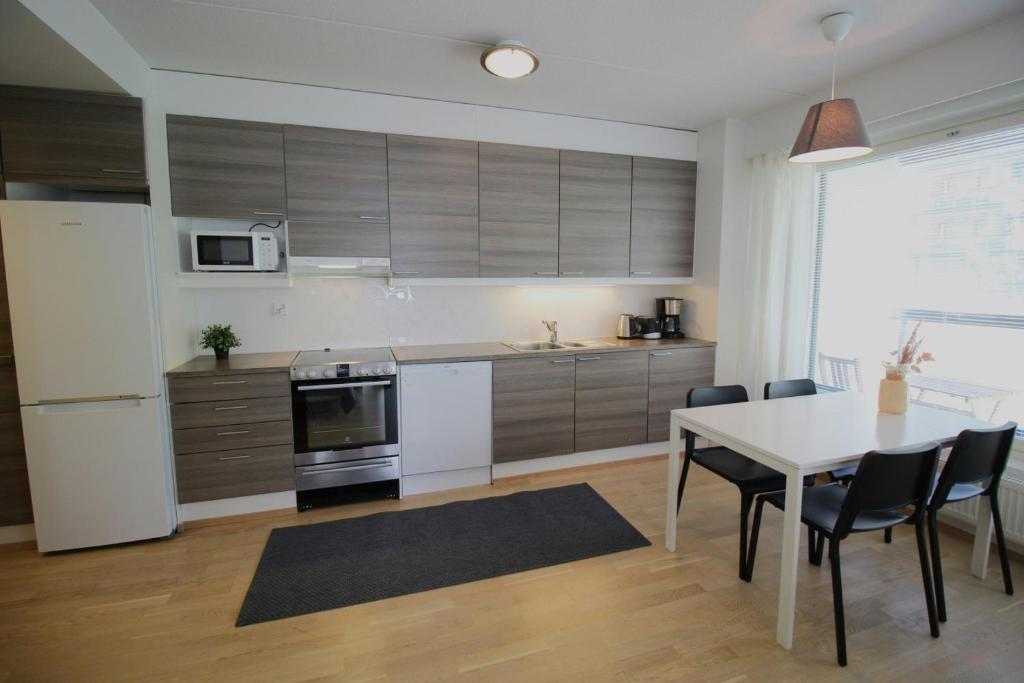 Dapur atau dapur kecil di Convenient Apartment for 5 with Sauna