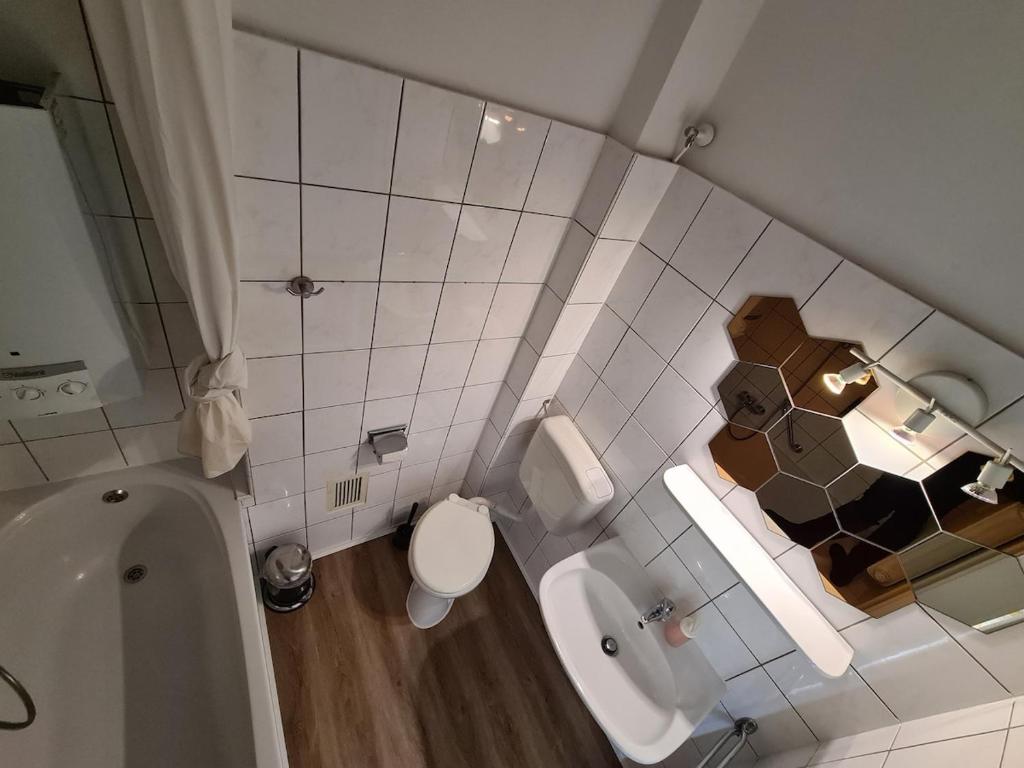 Bilik mandi di Süßes Studio Appartment in der City von Osnabrück