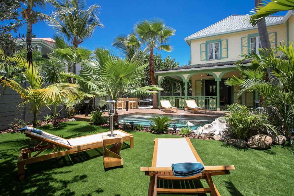 Taman di luar Plage de la BaieOrientale - Villa d'exception 6p - Piscine privée