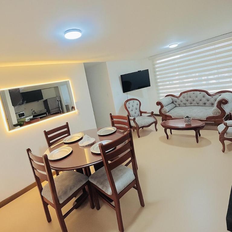 Μια τηλεόραση ή/και κέντρο ψυχαγωγίας στο Lujoso apartamento con todas las comodidades