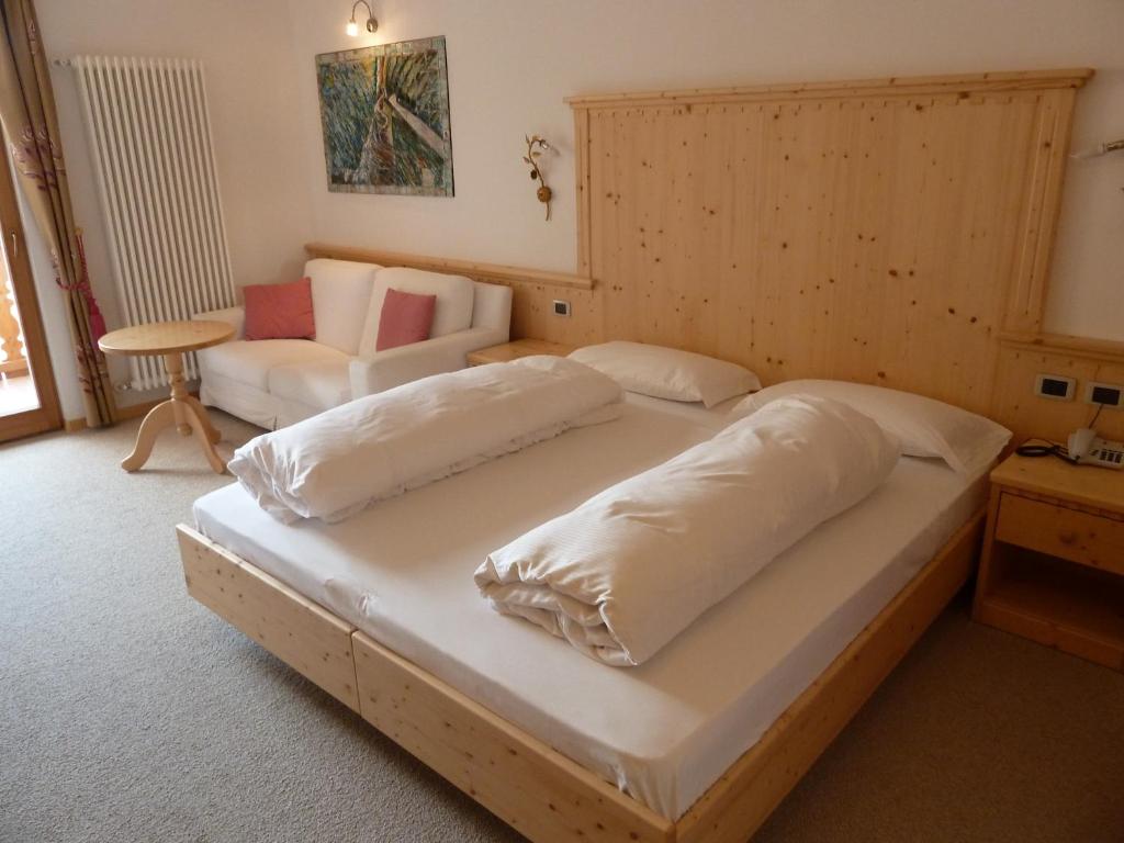 Postel nebo postele na pokoji v ubytování Hotel Rosa Resort