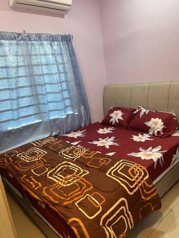 Ένα ή περισσότερα κρεβάτια σε δωμάτιο στο Golden Homestay