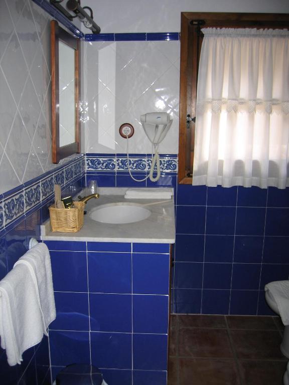 Un baño de Hotel de Montaña Cueva Ahumada
