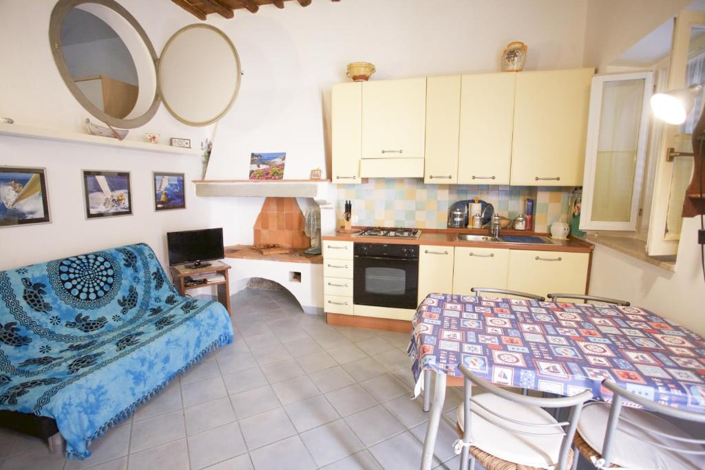 Η κουζίνα ή μικρή κουζίνα στο Appartamento Piazza Il Fico