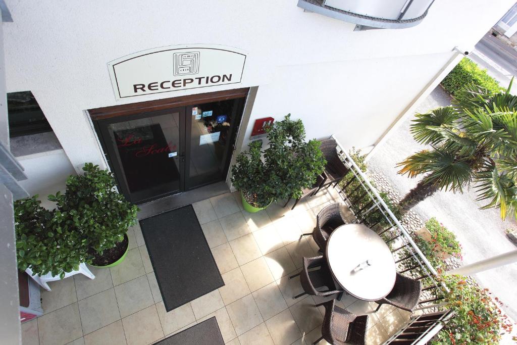 Vstupní hala nebo recepce v ubytování Hôtel la Scala