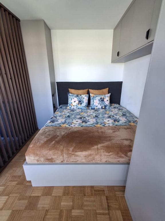 a bedroom with a large bed in a room at Core Luxembourg City - Schuman in Luxembourg