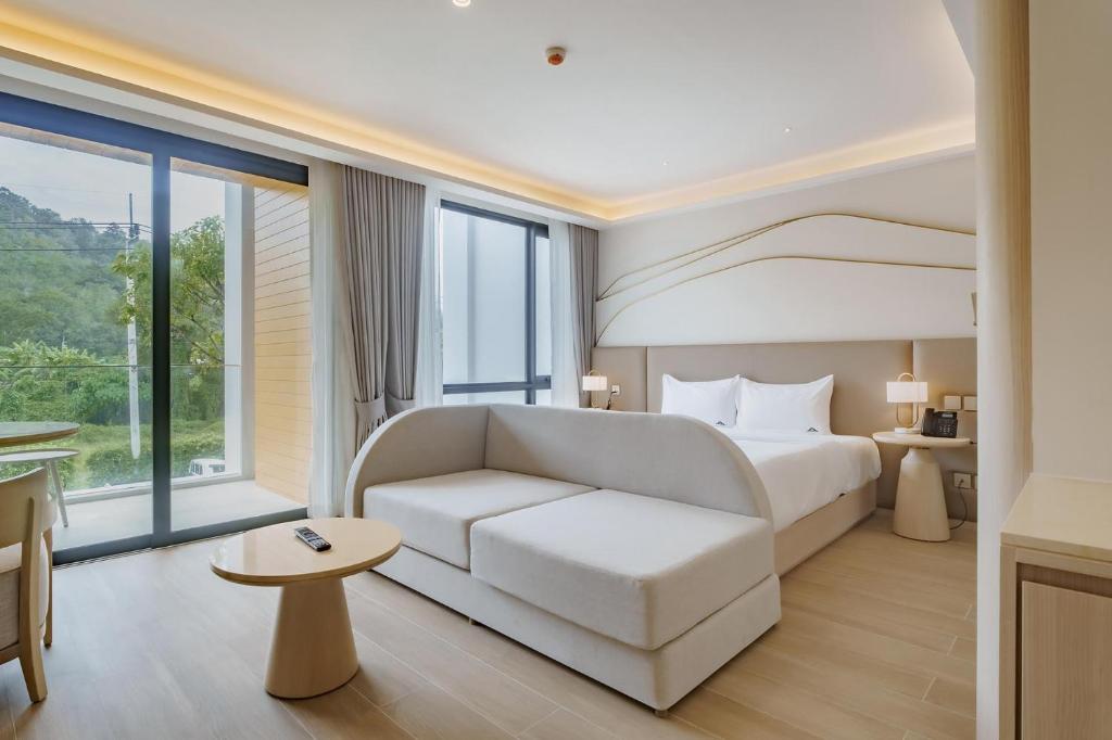 Ένα ή περισσότερα κρεβάτια σε δωμάτιο στο Wyndham Gardens Elegant Studio Forrest View 2228