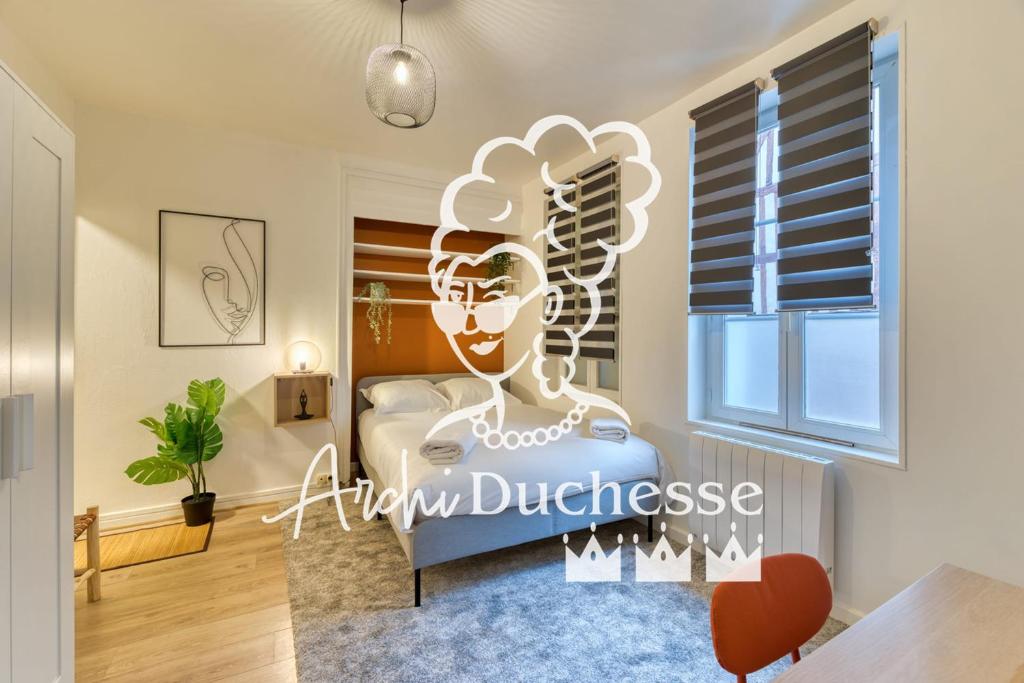 a bedroom with a mural of a woman at Ceylan bel F2 à Rouen in Rouen