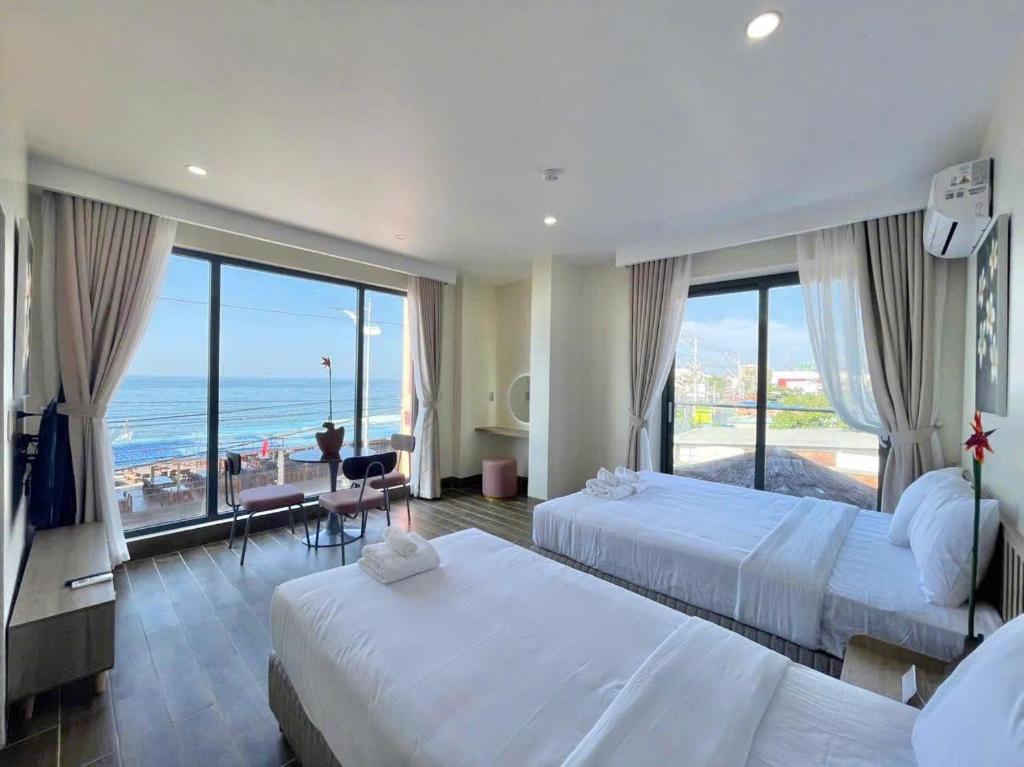 Una cama o camas en una habitación de Cham Charm Home Mui Ne