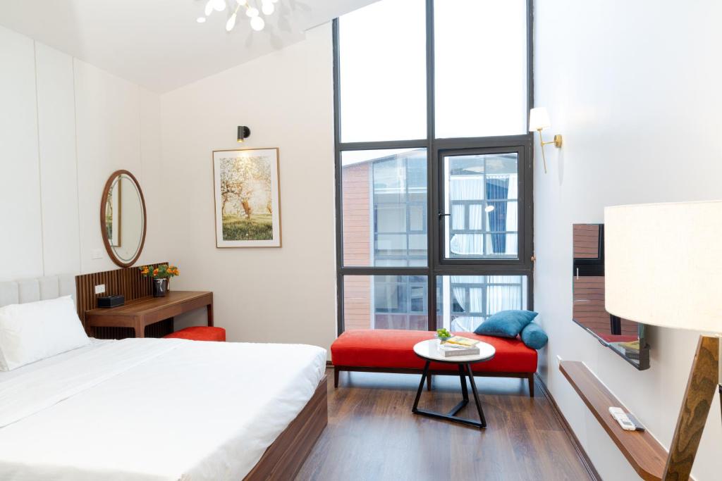 Postel nebo postele na pokoji v ubytování MYAN Villa Vinhomes Ocean Park 3