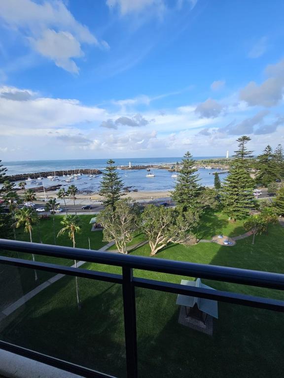 a view of the ocean from a balcony at Executive Penthouse Apartment in Wollongong