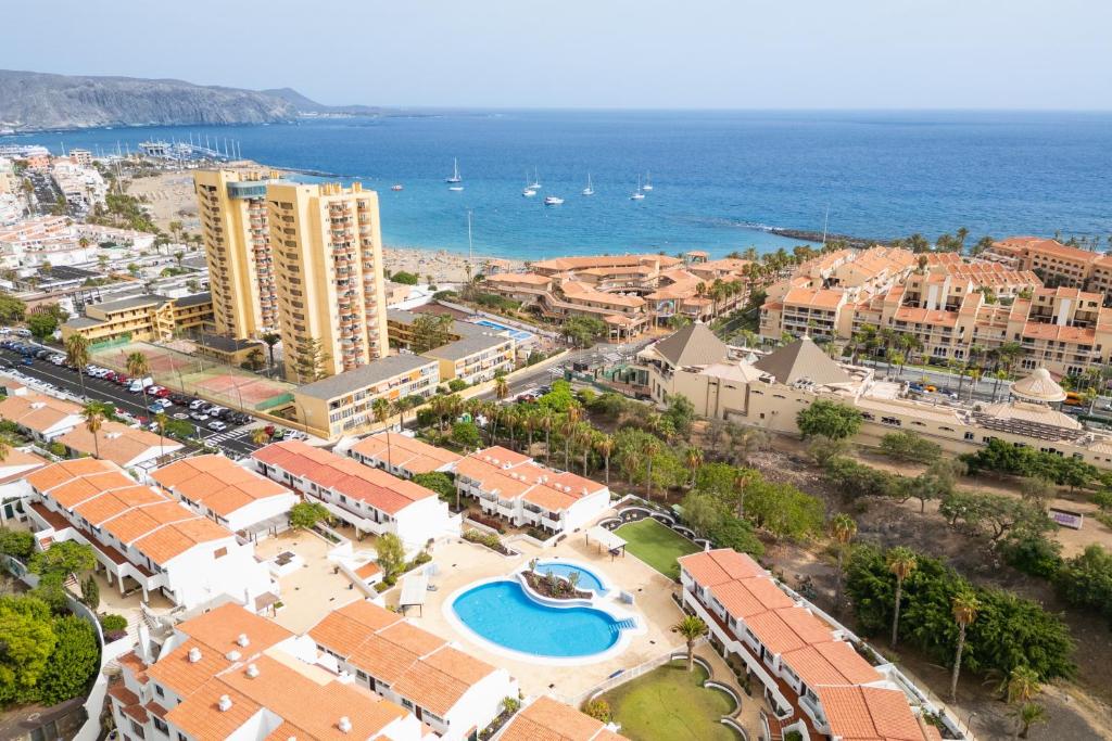an aerial view of a city and the ocean at Fabulous two bedroom apartment near las Vistas Beach in Los Cristianos in Arona