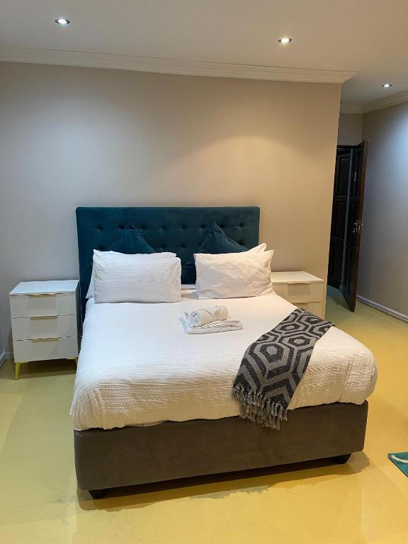 Ένα ή περισσότερα κρεβάτια σε δωμάτιο στο Nala Guest House
