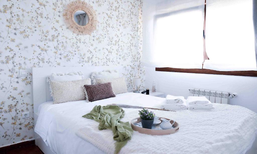 Postel nebo postele na pokoji v ubytování El apartamento de Santa Eva