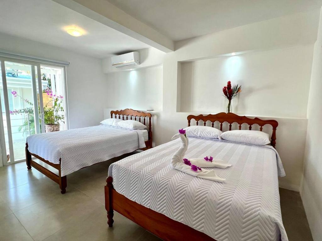 Katil atau katil-katil dalam bilik di Casa Blanca Manuel Antonio A1, Central, Pool, Gated