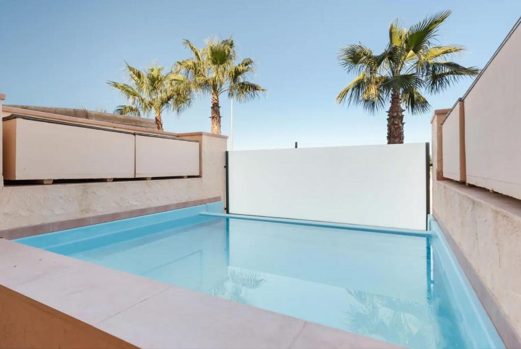 Bazén v ubytování Casita Palmera- Malasia 44 Precioso y Tranquilo Apartamento en Hacienda del Alamo nebo v jeho okolí