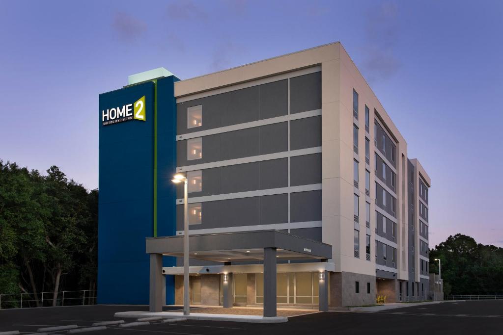 a rendering of a building with a hotel sign at Home2 Suites By Hilton Weston Ft. Lauderdale in Davie