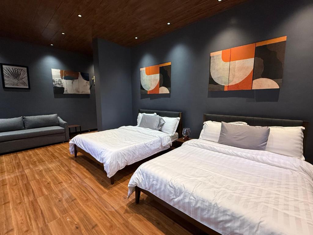 Ένα ή περισσότερα κρεβάτια σε δωμάτιο στο Casa Soleia Guesthouse Bataan