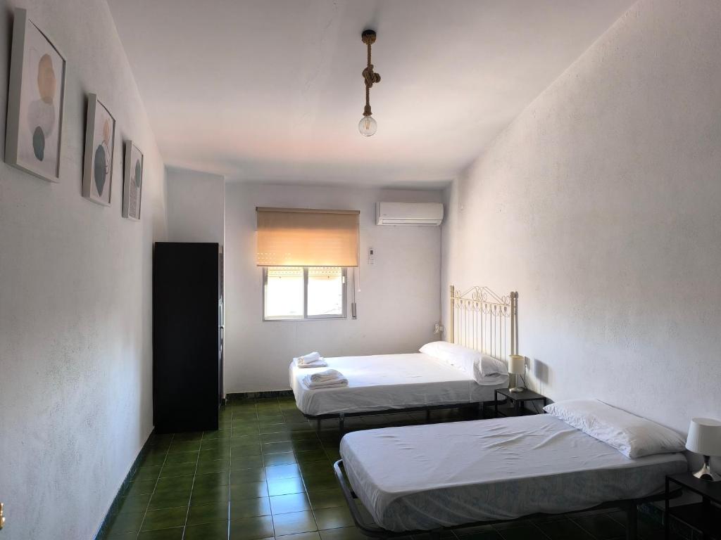 Ένα ή περισσότερα κρεβάτια σε δωμάτιο στο Apartamento Pozo Concejo